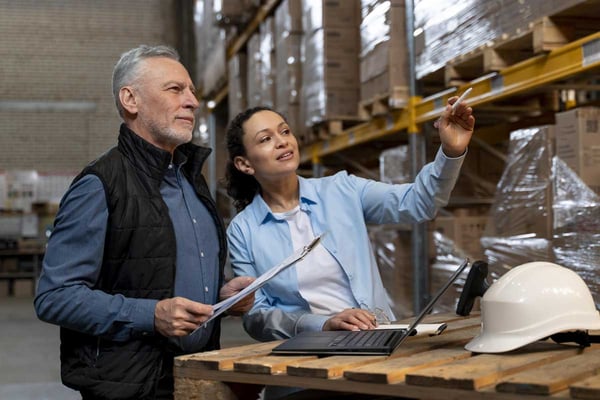 Food safety auditor reviewing records during an audit